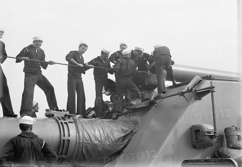 Target Practice - Cleaning 12' Gun, 1913. Creator: Unknown.