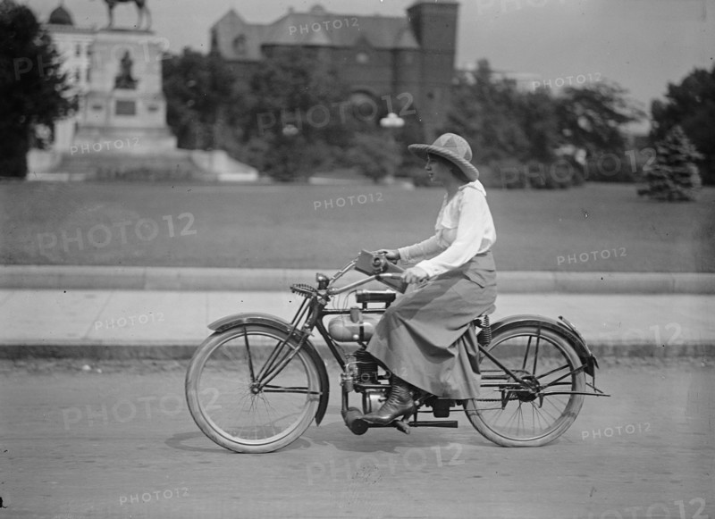 Woman On Bicycle, 1917 or 1918. Creator: Unknown.
