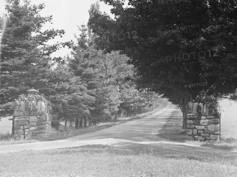 Entrance to the driveway of the Baldrige estate, 1931 July 25. Creator: Arnold Genthe.
