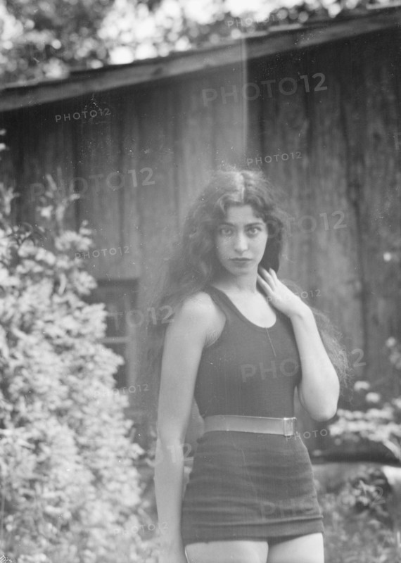 Anisfeld, Miss, standing outdoors, 1928 July 15. Creator: Arnold Genthe.