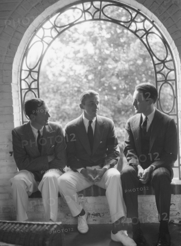 Brady, Mosely, and Scott group, seated in a window, 1930 May 24. Creator: Arnold Genthe.