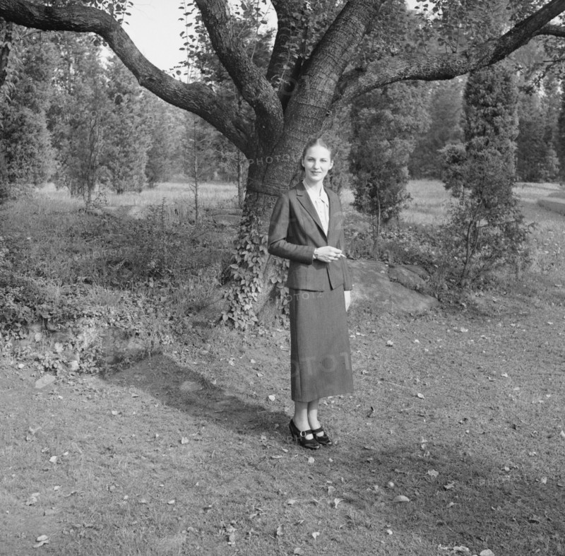 Ruth, standing outdoors by a tree, 1936 Creator: Arnold Genthe.