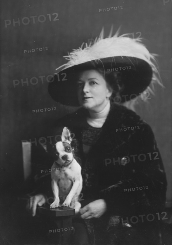 Brooks, Anita, Miss, with dog, portrait photograph, 1917 or 1918. Creator: Arnold Genthe.