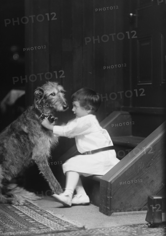 Plottner boy with dog, portrait photograph, 1907 Oct. 16. Creator: Arnold Genthe.