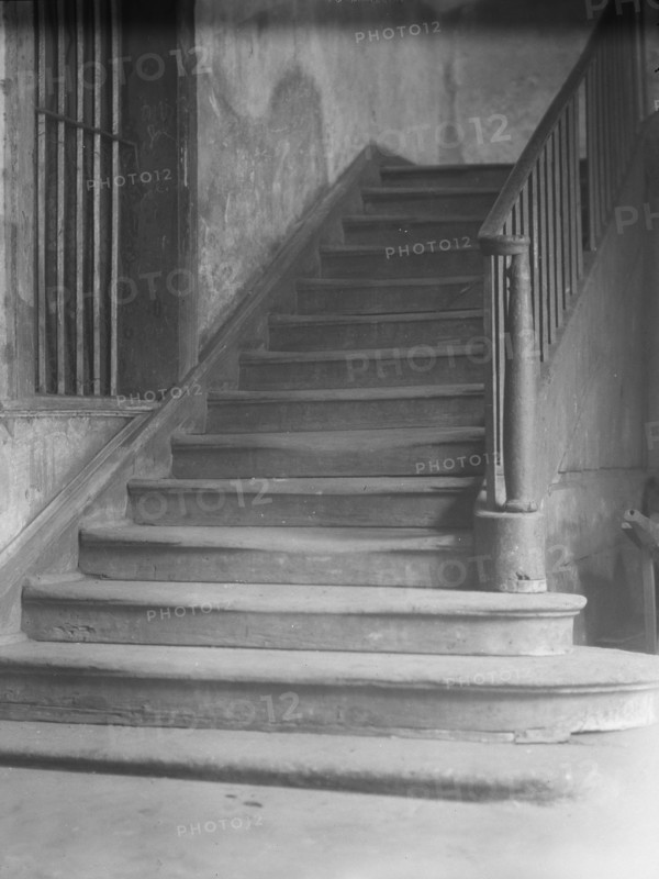 Window and stairway in the old Ursuline convent, New Orleans, between 1920 and 1926. Creator: Arnold Genthe.