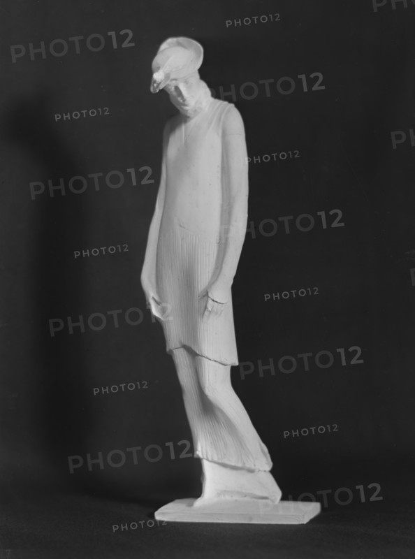 Statue of a woman by Mario Korbel, between 1914 and 1928. Creators: Arnold Genthe, Mario Korbel.