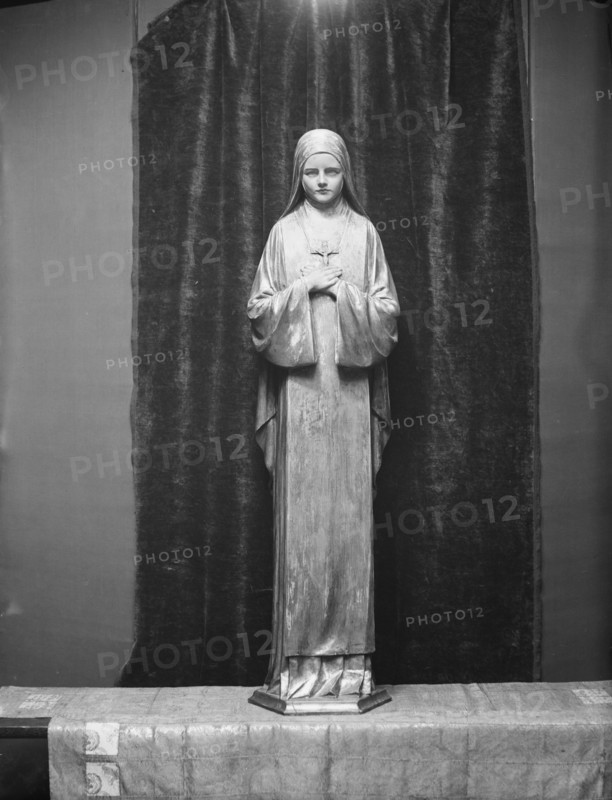 Statue of St. Theresa by Mario Korbel, between 1914 and 1928. Creators: Arnold Genthe, Mario Korbel.