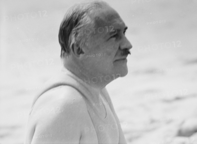Albert Herter at the beach, between 1932 and 1942. Creator: Arnold Genthe.