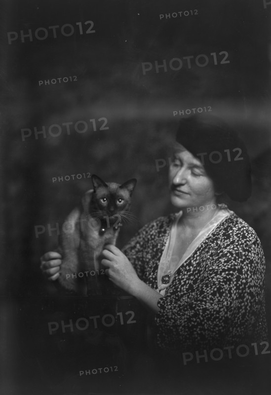 Malvina Hoffman with cat, portrait photograph, 1933 June 27. Creator: Arnold Genthe.
