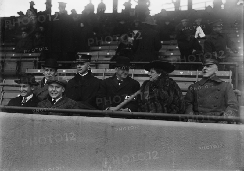 Marine Corps, U.S.N. Machine Gun Unit Demonstration at Ball Park - Daniels And Gen. Barnett, 1917. Creator: Harris & Ewing.