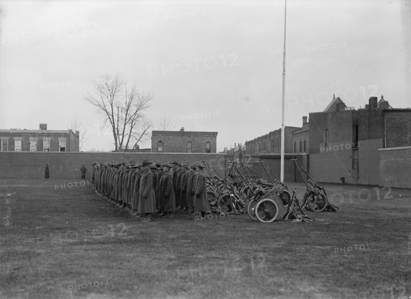 Marine Corps, U.S.N. Machine Gun Unit Demonstration at Ball Park, 1917. Creator: Harris & Ewing.