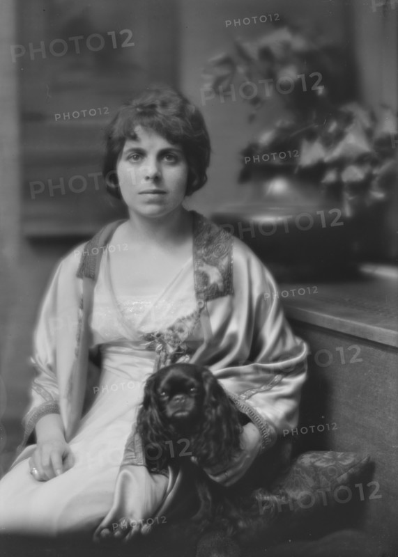 Sutro, Charles, Mrs., and dog, portrait photograph, 1913. Creator: Arnold Genthe.