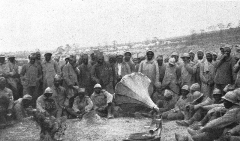'La Bataille de la Somme; La prise de la Maisonnette: les Senegalais autour d'un phonographe', 1916 Creator: Unknown.