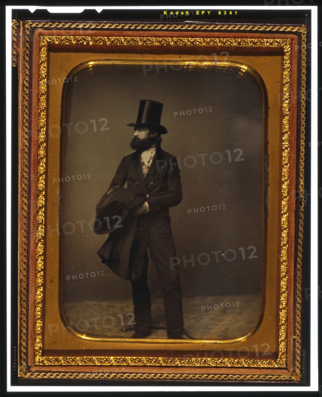 William Sidney Mount, full length portrait, facing left, wearing top hat..., between 1853 and 1860. Creator: Mathew Brady.