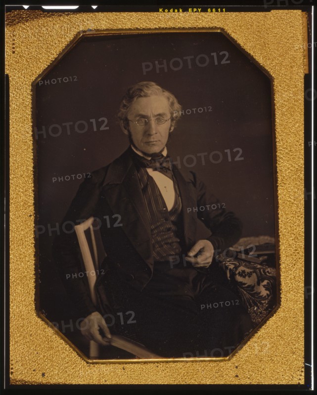 William Young McAllister, three-quarters length portrait, seated in a..., between 1848 and 1851. Creator: Marcus Aurelius Root.