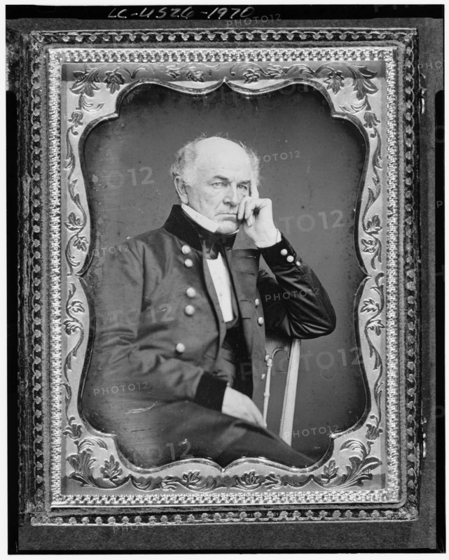 Ethan Allen Hitchcock, three-quarter length portrait, seated in chair..., between 1851 and 1860. Creator: Unknown.