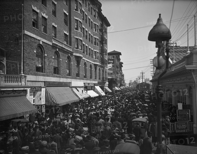 Atlantic City, N.J., the Boardwalk parade, between 1890 and 1906. Creator: Unknown.