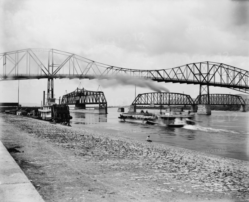 Levee below the bridge, The, between 1880 and 1899. Creator: Unknown.