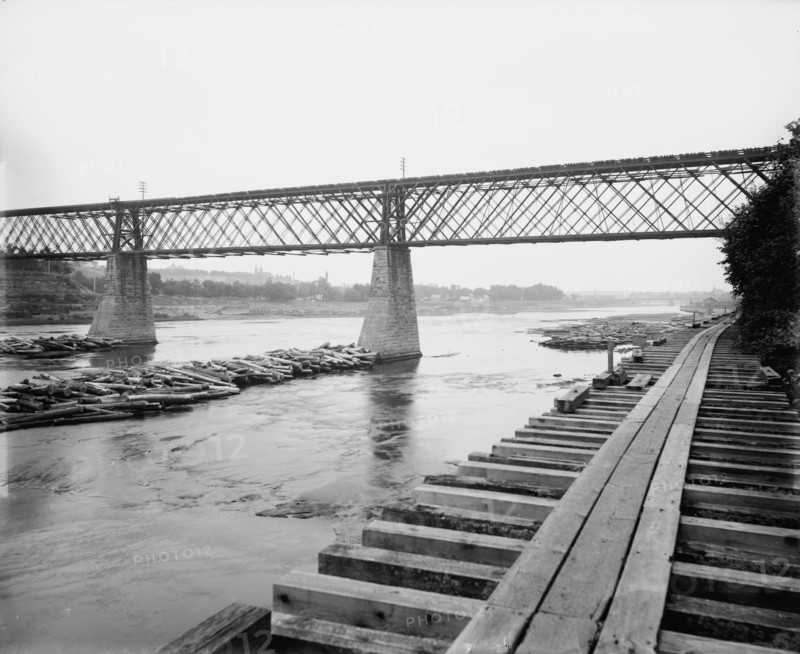 Eau Claire from the railroad bridge, between 1880 and 1899. Creator: Unknown.