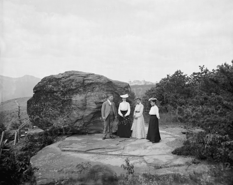 Mr. H.E. Eder and family at Bowlder [i.e. Boulder] Rock, between 1900 and 1905. Creator: William H. Jackson.