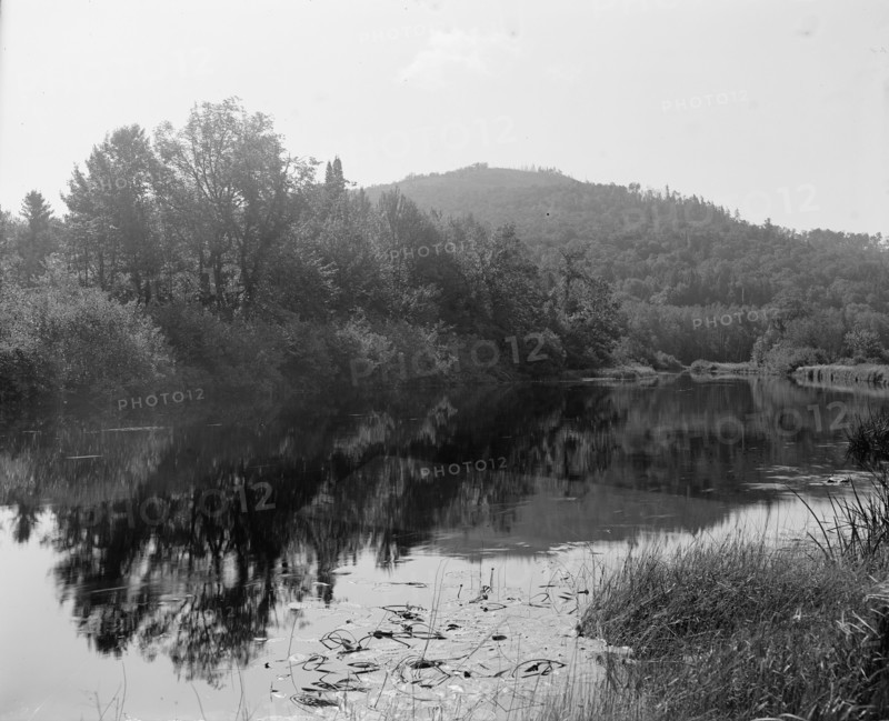 Saranac River below Saranac Lake, Adirondack Mts.,N.Y., between 1900 and 1910. Creator: Unknown.