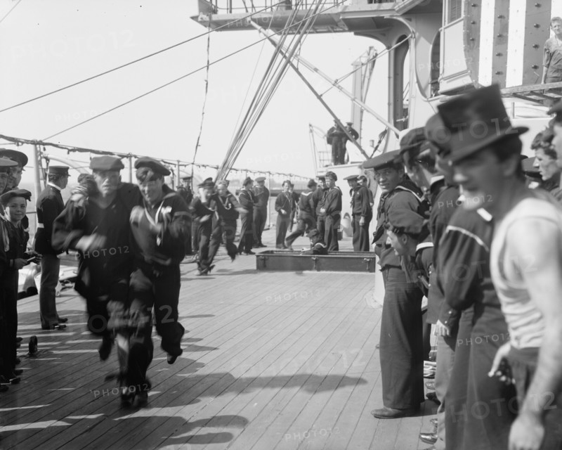U.S.S. New York, 3 legged race, anniversary of Santiago, 1899 July 3. Creator: Unknown.