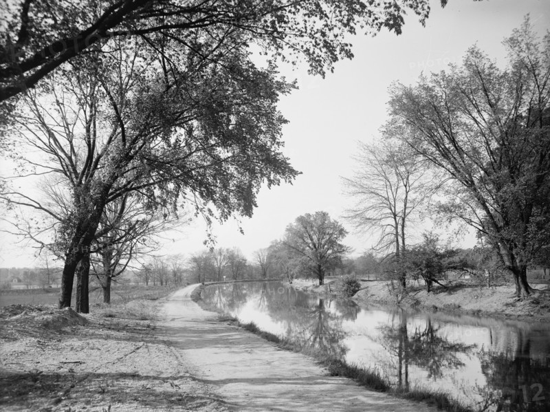 Bicycle path and canal, Indianapolis, Ind., between 1900 and 1910. Creator: Unknown.