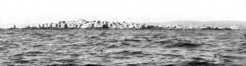 'Le drapeau Francais sur la cote Syrienne; L'ile Rouad, a 2 kilomtres de la cote..., 1915 (1924). Creator: Unknown.