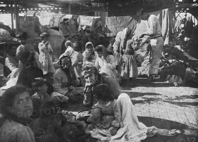 'L'aide Francaise aux Armeniens; Campes sur le pont du croiseur ou'ils avaient..., 1915 (1924). Creator: Unknown.