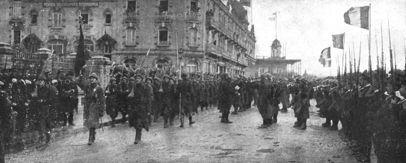 'Le deuxieme anniversaire de L'Yser; le defile du 12e de ligne belge, son glorieux..., 1916. Creator: Unknown.