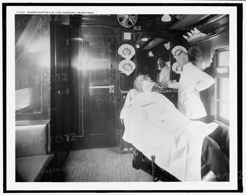 Barber shop on a deluxe overland limited train, between 1910 and 1920. Creator: Unknown.
