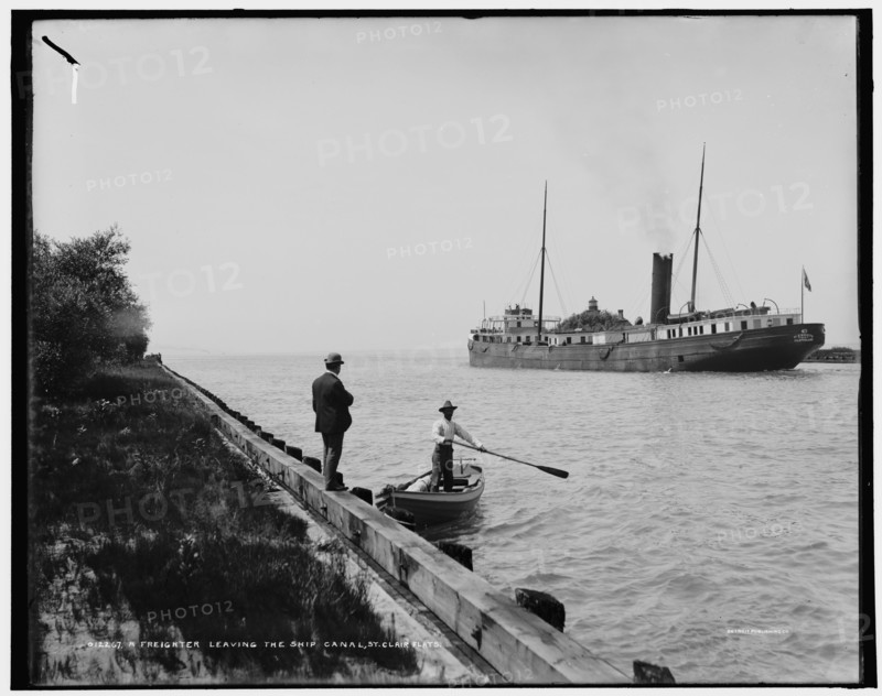 A Freighter leaving the ship canal, St. Clair Flats, between 1890 and 1901. Creator: Unknown.