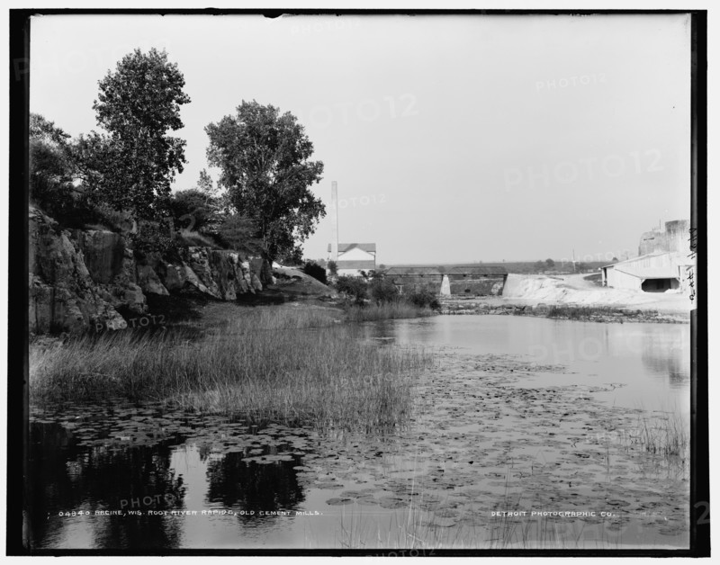 Racine, Wis., Root River rapids, old cement mills, between 1880 and 1899. Creator: Unknown.
