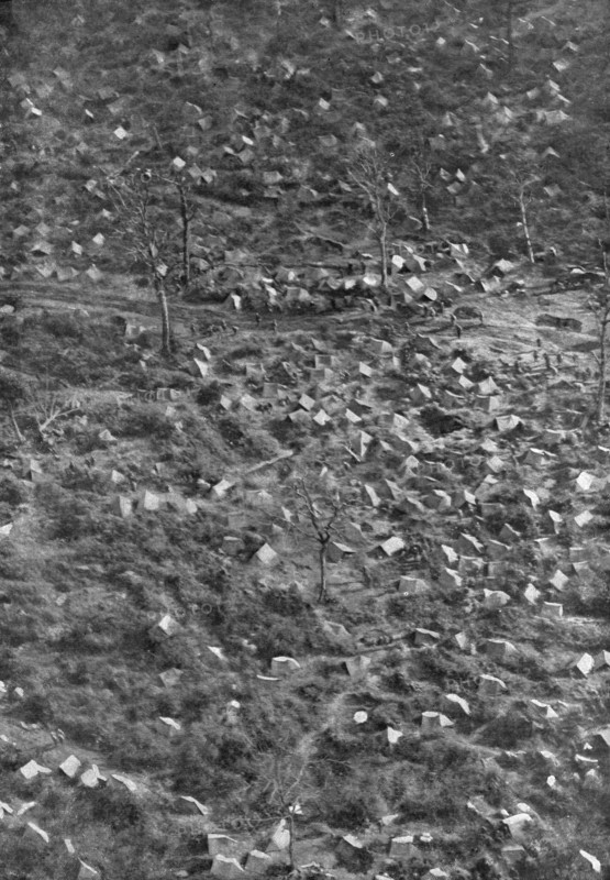 ''En survolant L'Argonne; Troupes americains campees sous des tentes individuelles..., 1918. Creator: Unknown.