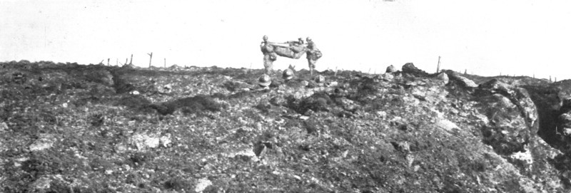 'Le champ de bataille; Sur le Chemin des Dames: un officier blessé est emporté sur un..., 1917. Creator: Unknown.
