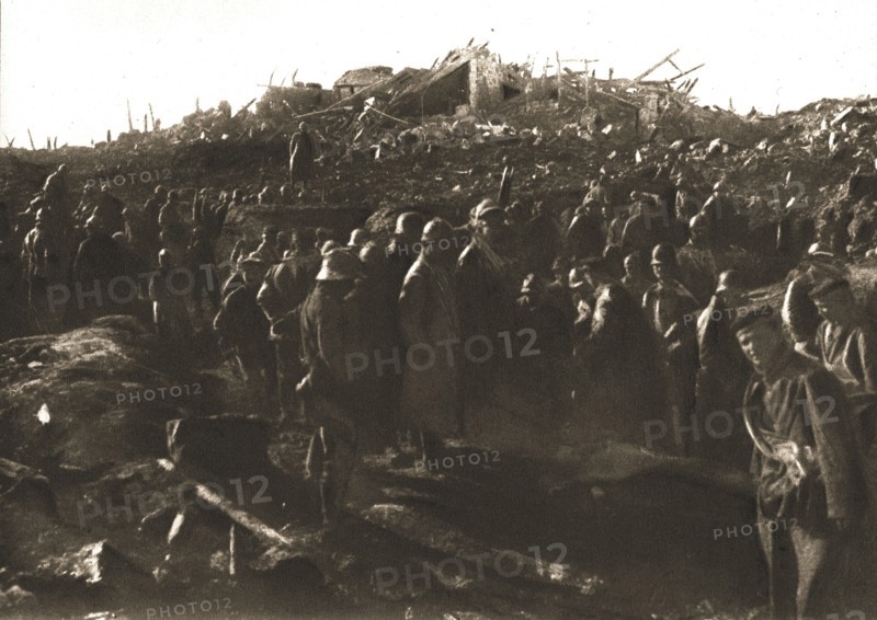 In Recaptured Territory; The evening of October 23, 1917: gathering German prisoners,... 1917. Creator: Unknown.