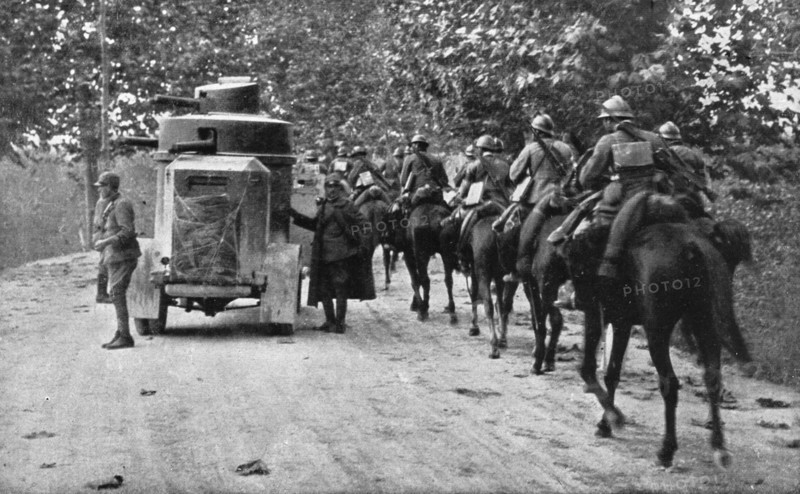 The Dark Hours of Italy; Armored car and cavalry protecting the retreat of a column.., 1917. Creator: Unknown.