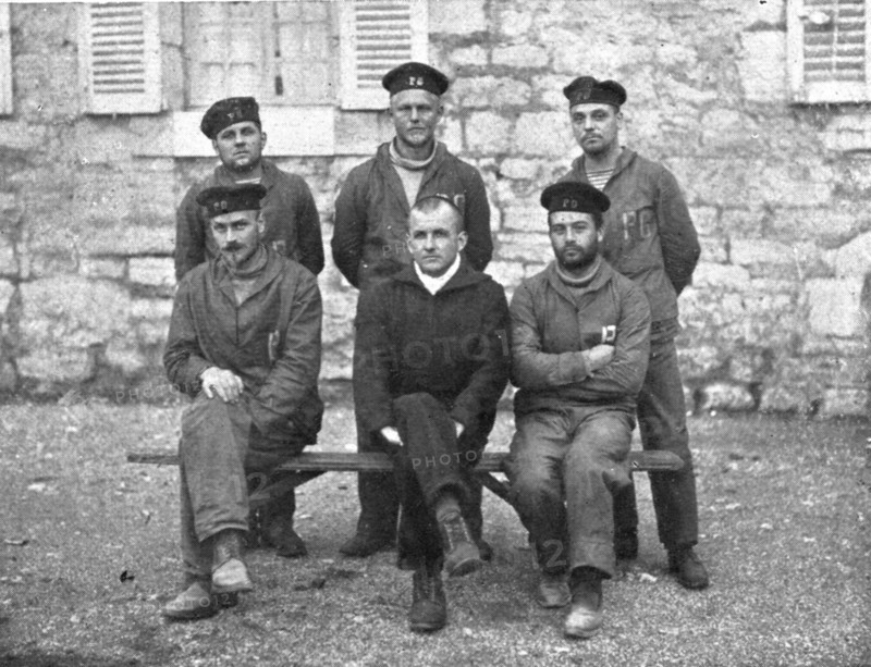 A torpedoing immediately avenged; The commander of 'UC-38', seated in the middle..., 1917. Creator: Unknown.