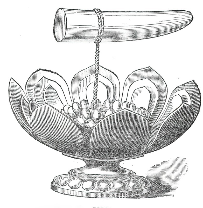 The Dalada, or tooth relic of Buddha, and golden lotus flower in the Maligawa Temple, Kandy..., 1876 Creator: Unknown.