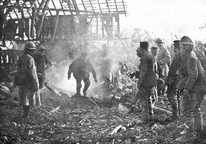 'Dans Cantigny; au milieu de la fumee des lance-flammes, les Allemands, un par un..., 1918. Creator: Unknown.