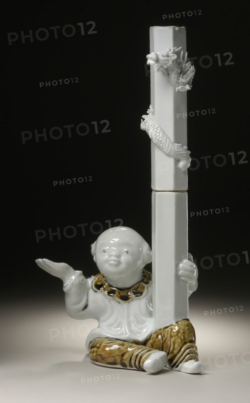 Chinese Boy (karako) Holding Candlestick with Raised Dragon, 19th century. Creator: Unknown.