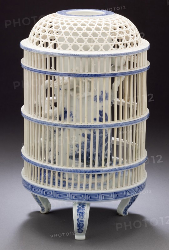 Bird in a cage, Late 19th century. Creator: Unknown.