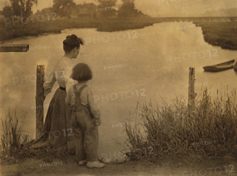 Woman and Child by a River, c.1910. Creator: Gertrude Kasebier.
