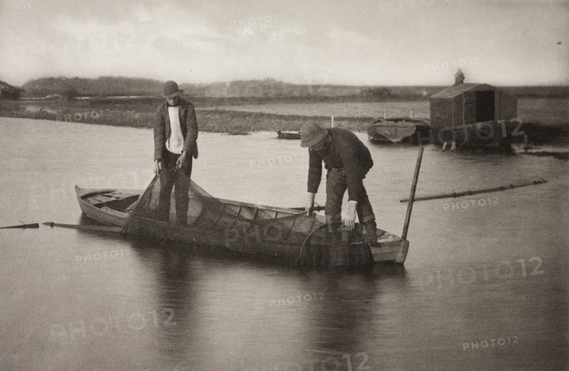 Taking Up the Eel-Net, 1886. Creator: Peter Henry Emerson.