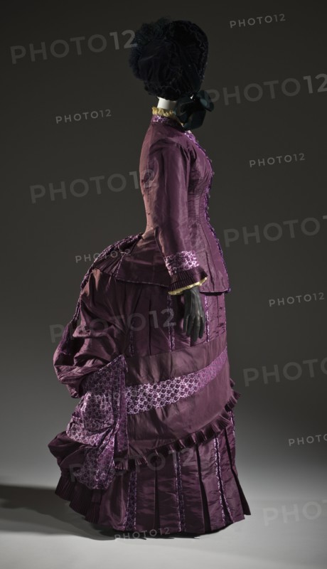 Woman’s 2-piece silk bustle dress, France, c.1885. Creator: Unknown.