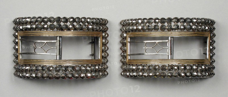 Pair of man’s steel and gilt wire shoe buckles, England, c.1777 and c.1785. Creator: Unknown.