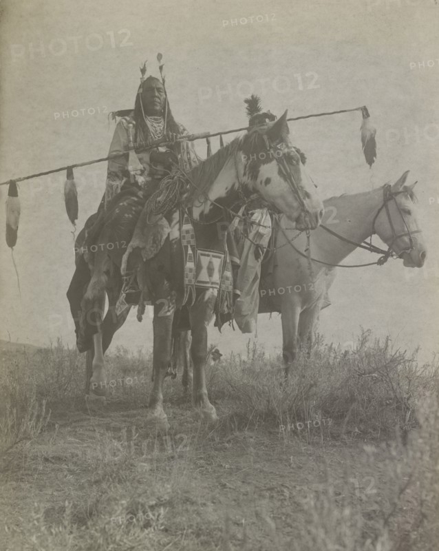 Village criers on horseback, Bird On the Ground and Forked Iron, Crow Indians, Montana, c1908. Creator: Edward Sheriff Curtis.