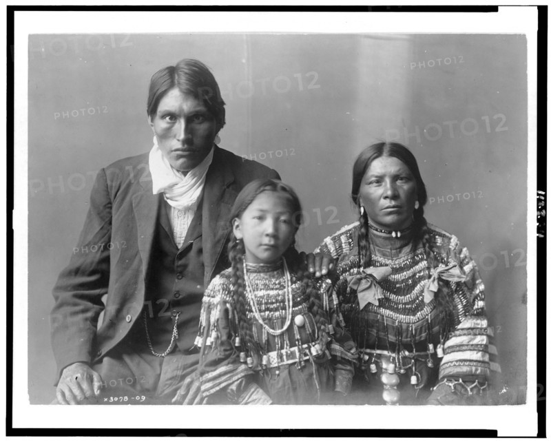 Reuben Black Boy and family, c1910. Creator: Edward Sheriff Curtis.
