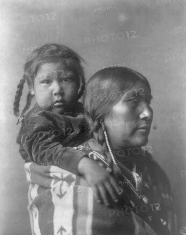 Apsaroke mother, c1908. Creator: Edward Sheriff Curtis.
