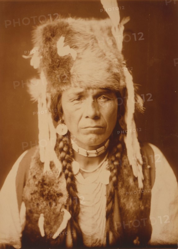 Nez Percé with furcap, c1904. Creator: Edward Sheriff Curtis.